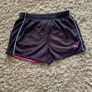Puma Athletic Shorts in Black/Pink. Girls Large (12-14)